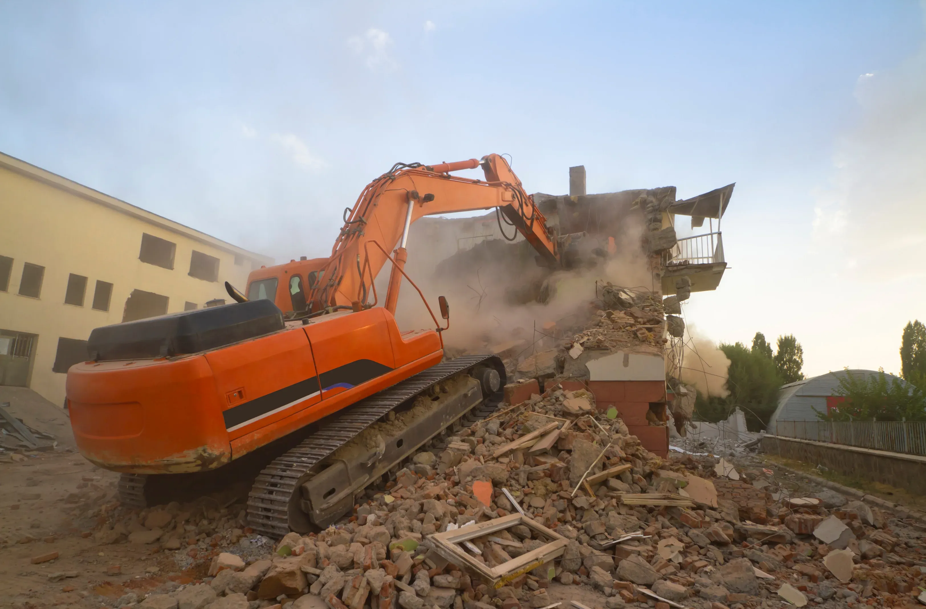 Licensed demolition contractor clearing a building site near Melbourne